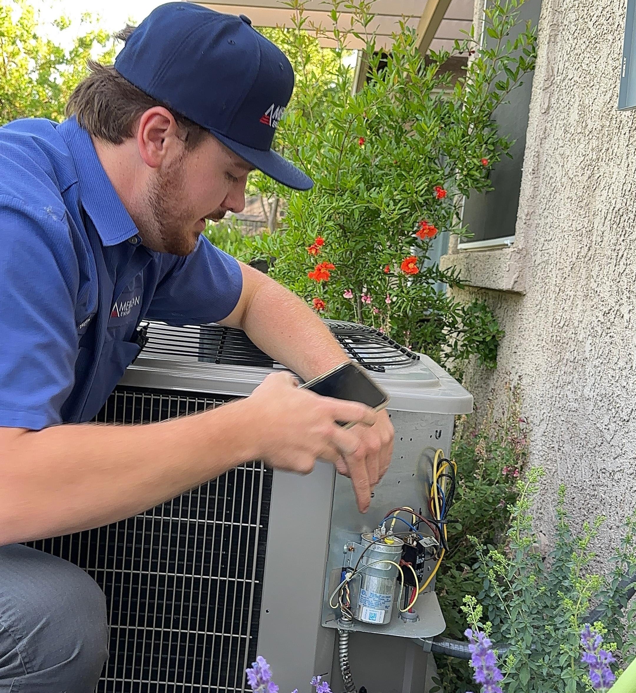 Close-up of a heat pump unit showing visible signs of common issues like a clogged air filter, ice buildup, and debris around the fan.