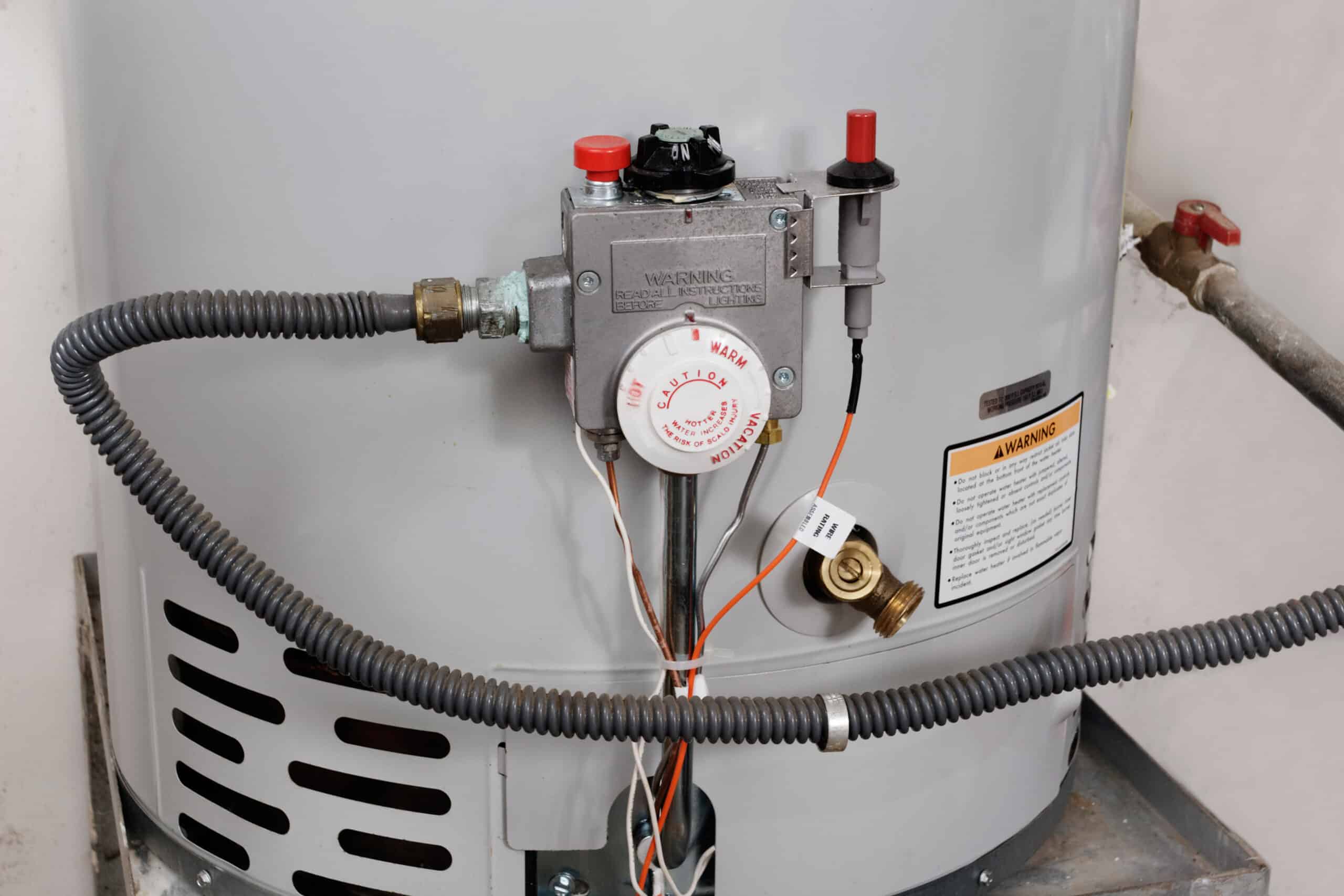 Residential water heater unit with gas line and temperature control valve installed
